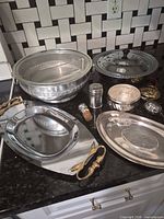Group shot showing all metal items on countertop