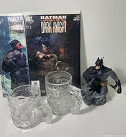 Group shot of comics, mugs and figurine