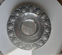 Top view showing full bowl and ornate studded rim