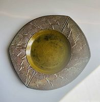 Top view showing overall form, glaze colours and rim pattern