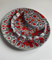 Top view of signed studio pottery ashtray with frozen pond glaze