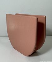 Front angled view of the dusty-rose geometric ceramic vase showing overall shape and finish