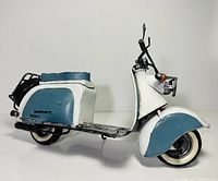 Left side view of metal Lambretta scooter model