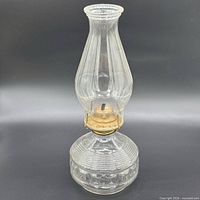 Full view of hurricane lamp with chimney attached