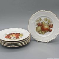 Stack and single display of six fruit motif Bavarian plates