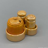 Front view of entire ceramic set in tray