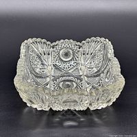 Front view of clear pressed glass square bowl