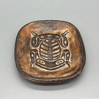 Top view showing full frog motif and square form