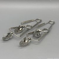 Full view of both stainless steel ice tongs