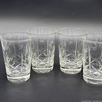 Four crystal tumblers front view showing pattern