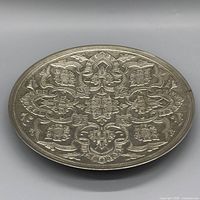 Full view of silver-plated ornate oval tray