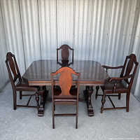 Front view of dining table with six chairs