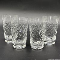 All four Webb Corbett Georgian crystal highball glasses front view