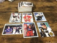 Stack of cards with six sample cards displayed including Messier Brothers, Dallas Drake etc.