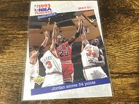 Front of 1993 Upper Deck NBA Playoffs Highlights Michael Jordan card showing action photo, date May 31, score note