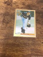 Front of sleeved Score Gold Rush Chipper Jones card