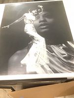 Overall view of framed black and white Diana Ross photographic poster