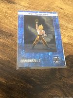 Front of sleeved Super Saiyan Goku FilmCardz promo card