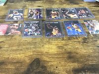 All ten Magic Johnson cards laid out in sleeves