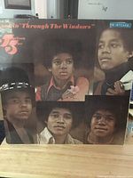 Front cover of The Jackson 5 Lookin’ Through The Windows LP showing overall condition