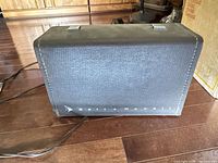 Front of black vinyl Bell & Howell carrying case