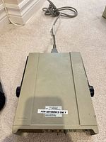 Top view showing housing and attached power cord