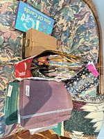 Stack of gift bags, storage box, tissue paper and card set