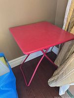 Table in corner showing top and legs