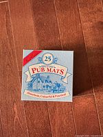 Lid of storage box showing product title and graphics