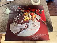 Front of Studio Nova Winter Wonderland cake plate box showing product image and branding