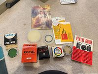 All items laid out: filters, boxes, pouch, booklets