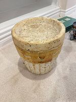 Overall view of polystyrene bucket showing shape and general wear