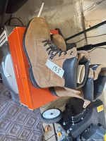 Boots side view on box showing overall style and color