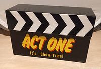 Front of box showing ACT ONE logo and chevron design