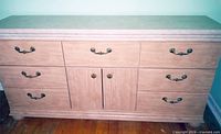Front view of double dresser showing drawer layout and hardware