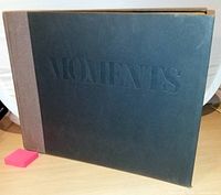 Hardcover front of Moments book