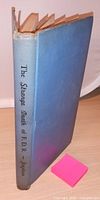 Closed blue cloth hardcover showing spine title
