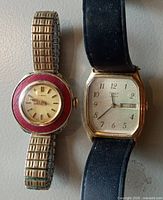 Both watches side by side showing overall design and bands