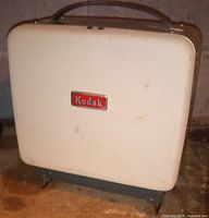 Projector closed, Kodak badge on cream lid