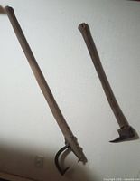 Both hook tools full length against wall