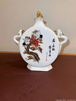 Front view showing cranes, pine tree, calligraphy, gold accents