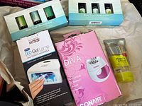 All four boxed and packaged personal care items