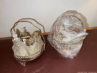 Condiment carrier with four bottles and wrapped sugar basket