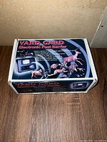Closed retail box showing Yard Gard branding and product images