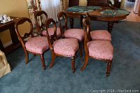 Front view of all six balloon back chairs arranged in two rows