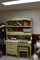 Front view of painted wood desk with hutch and matching chair