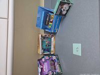 Overview of three boxed toys: Treasure Chest Dive, Harry Potter Honeydukes playset, Secret Finders Magic Mailbox