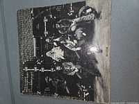 Front gatefold cover showing band photo, visible edge wear