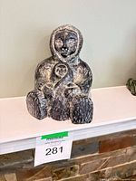 Front view of Al Wolf mother and child sculpture