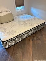 Queen mattress with comforter and pillows